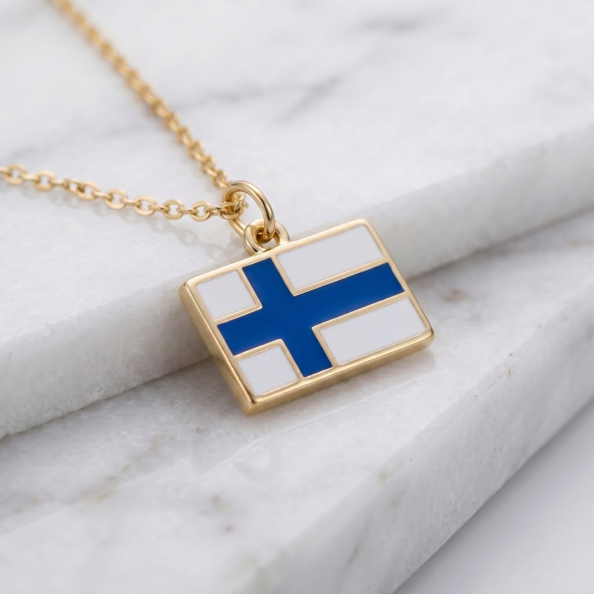 Finnország zászló charm · Arany