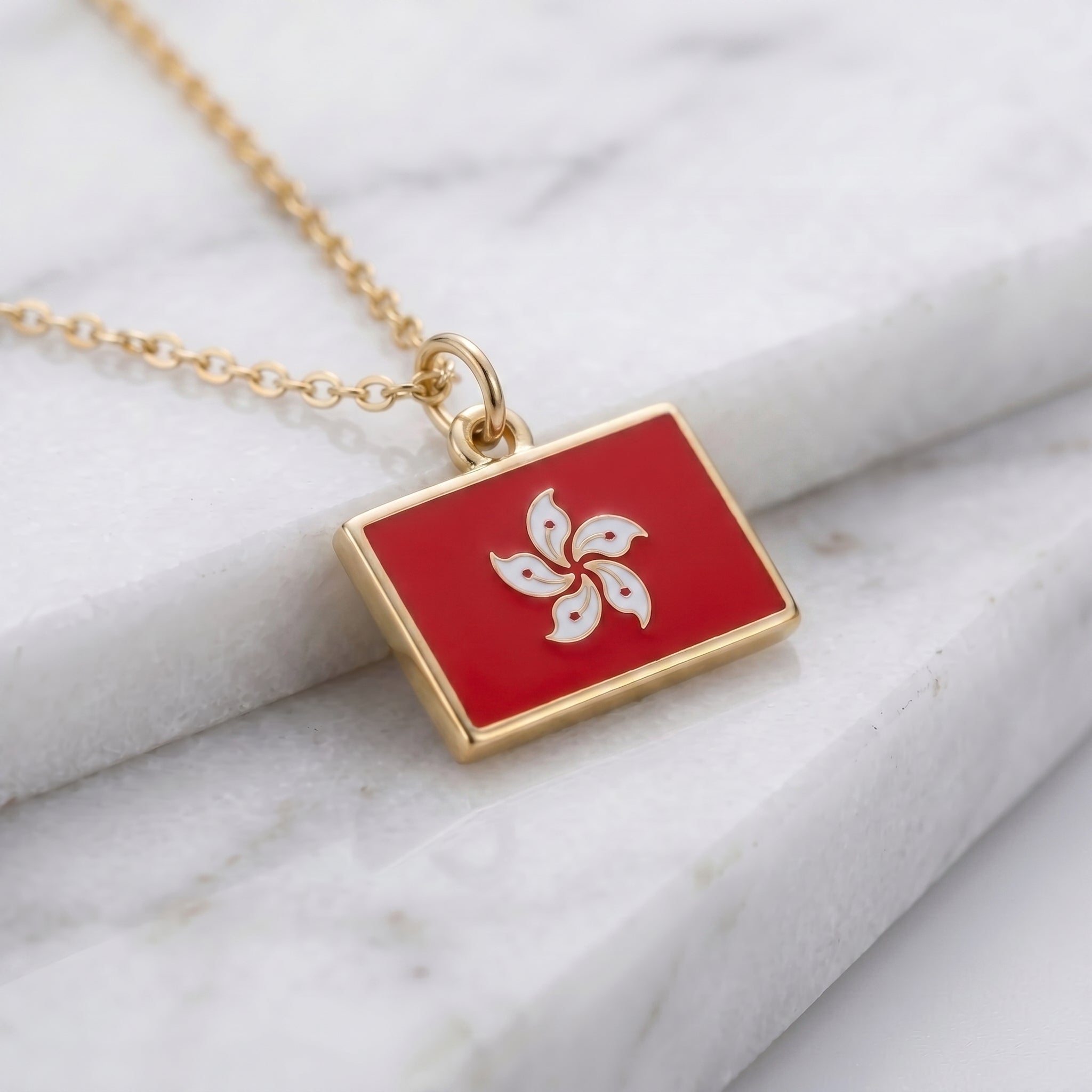 Hongkong zászló charm · Arany