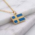 Svédország zászló charm · Arany
